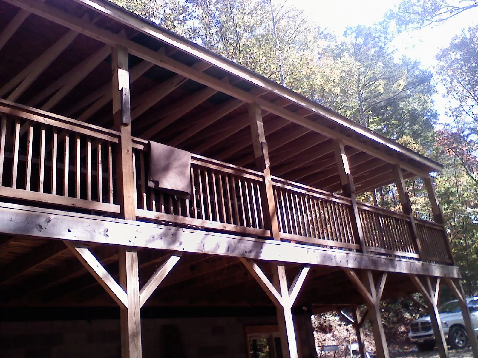 Timber framing under a new elevated porch and deck — Roof Leak Repair in Grayslake by Roofing Brothers